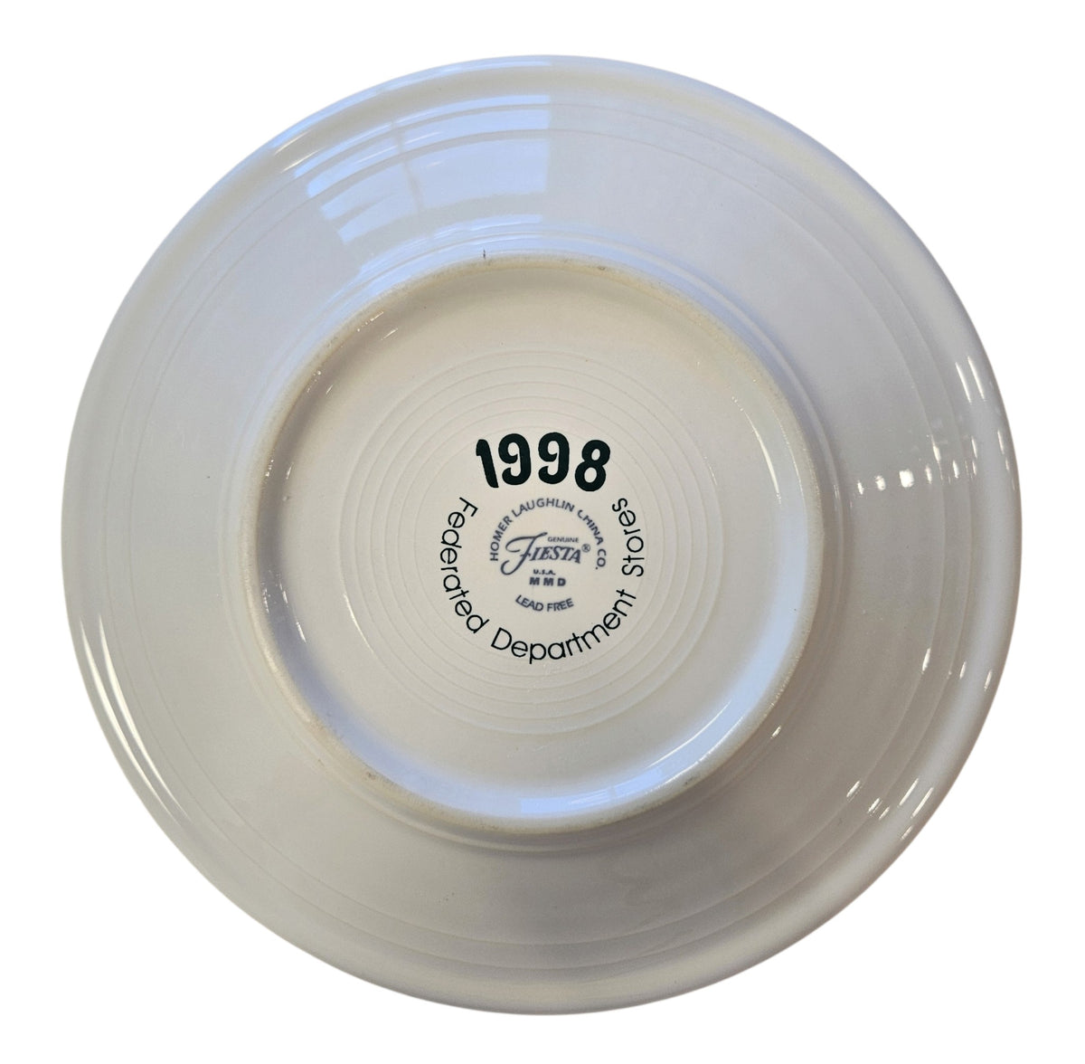 This is a Fiesta Fiestaware Classic Luncheon Plate featuring Federated Department Store's Christmas decal on White. Post 1986, Lead-free, Decorated, Retired Decal, Christmas, Disk Pitcher, Ring Handled Mug, Greenery
