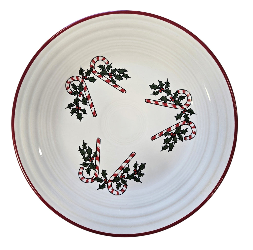 This is a Fiesta Fiestaware Classic Luncheon Plate featuring Bon-Ton's Candy Cane decal on White. Post 1986, Lead-free, Decorated, Retired Decal, Christmas
