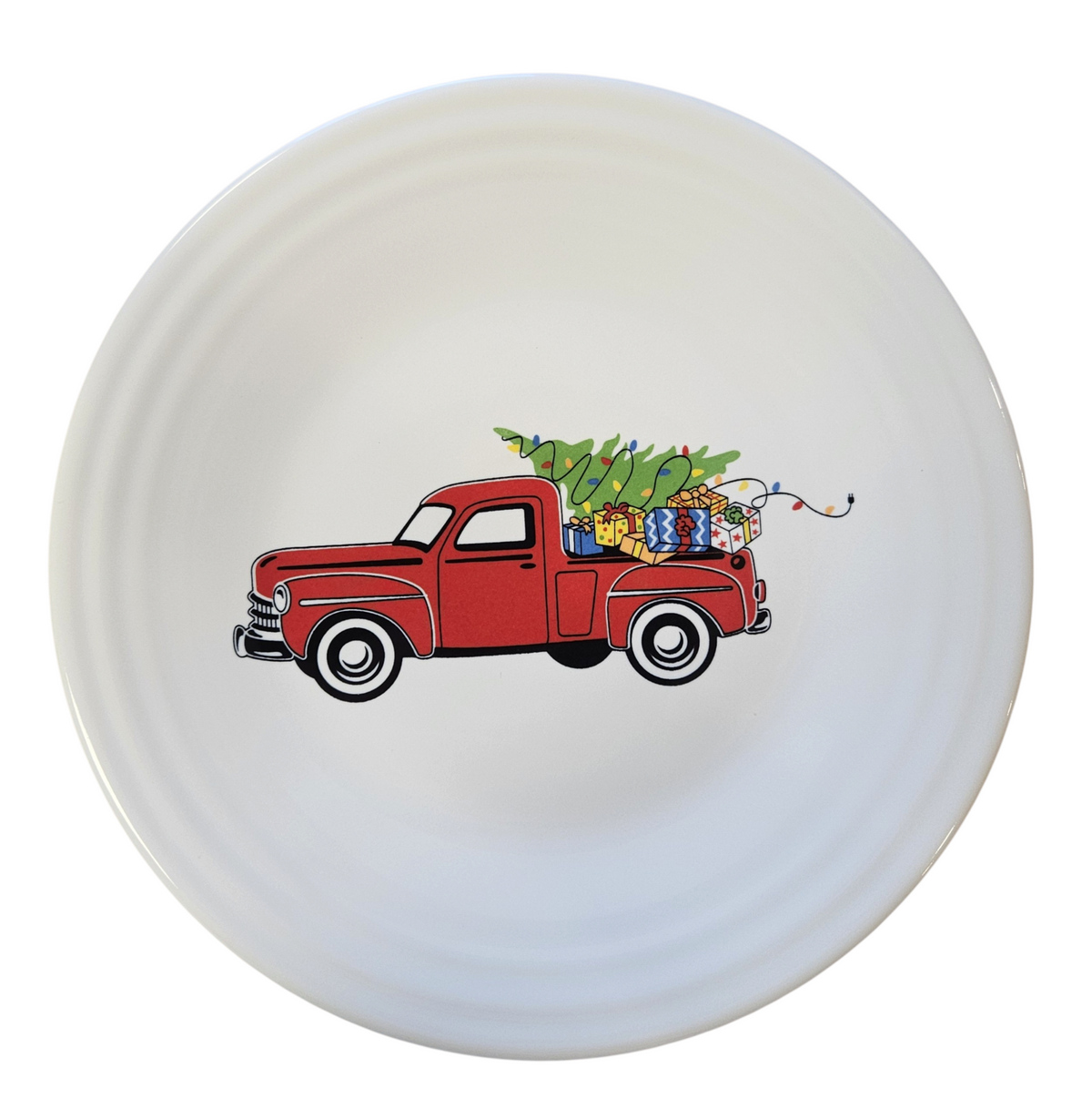 This is a Fiesta Fiestaware Classic Luncheon Plate featuring the Belk's Holiday/Christmas Farm Truck decal on White. Post 1986, Lead-free, Christmas, Decorated, Retired Decal
