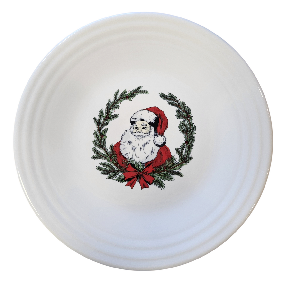 This is a Fiesta Fiestaware Classic Luncheon Plate featuring Replacements.com exclusive Old Saint Nick decal on White. Post 1986, Lead-free, Decorated, Christmas, Santa
