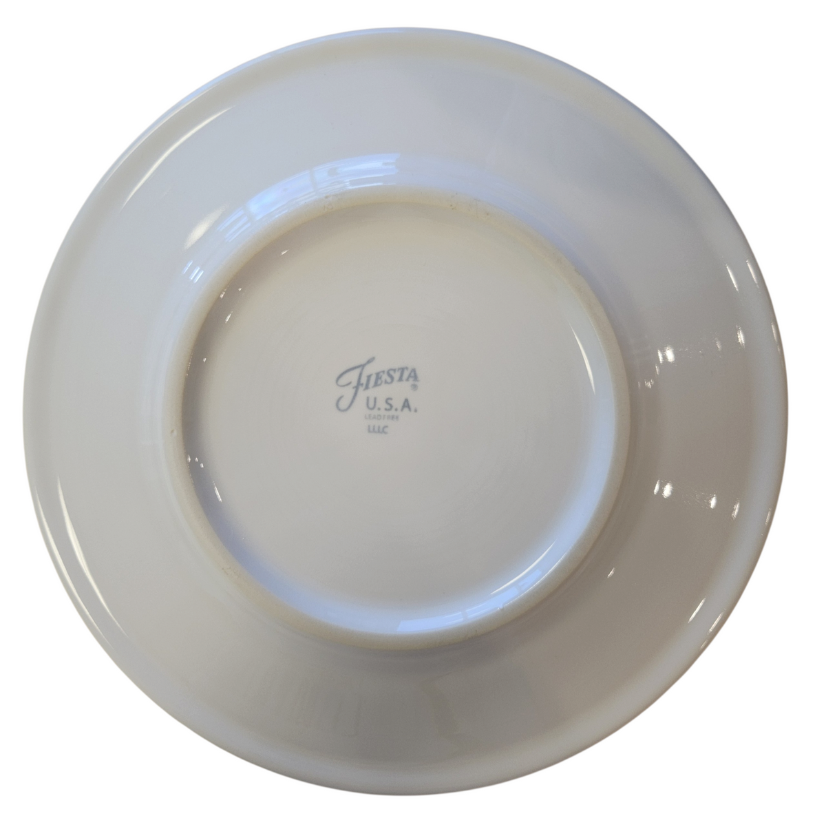 This is a Fiesta Fiestaware Classic Luncheon Plate featuring Replacements.com exclusive Old Saint Nick decal on White. Post 1986, Lead-free, Decorated, Christmas, Santa
