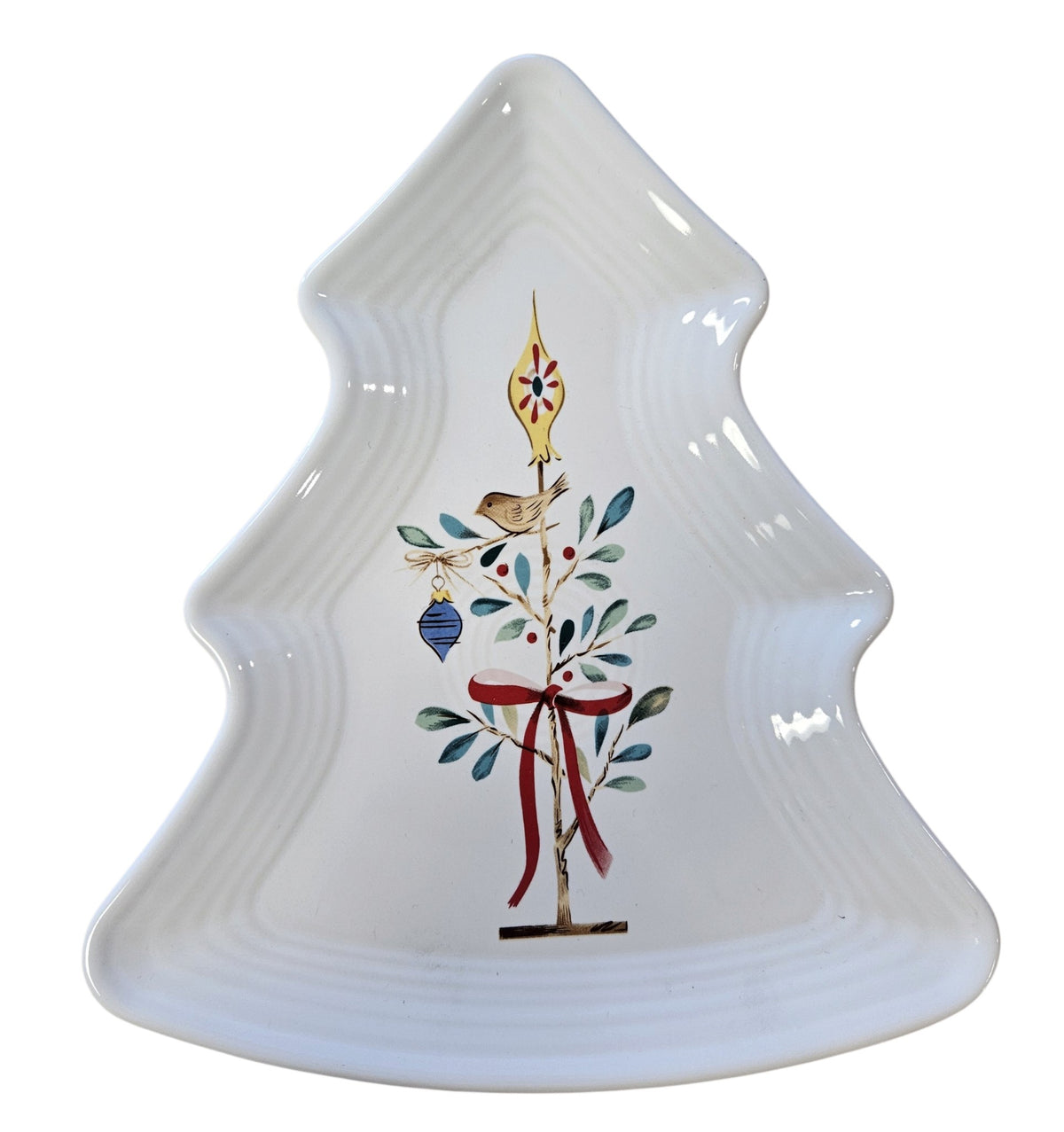 This is a Fiesta Fiestaware Tree Shaped Plate featuring the Fiesta Nutcracker Holly & Berry decal on white. Post 1986, Lead-free, Christmas
