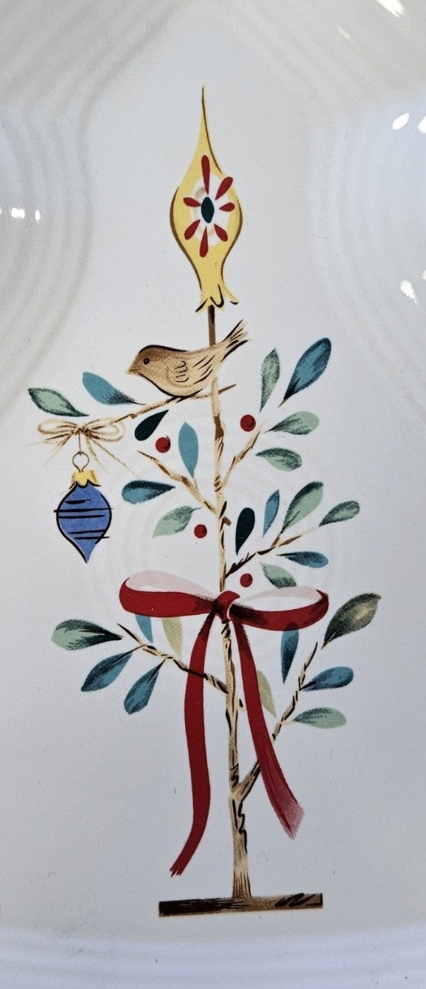 This is a Fiesta Fiestaware Tree Shaped Plate featuring the Fiesta Nutcracker Holly & Berry decal on white. Post 1986, Lead-free, Christmas
