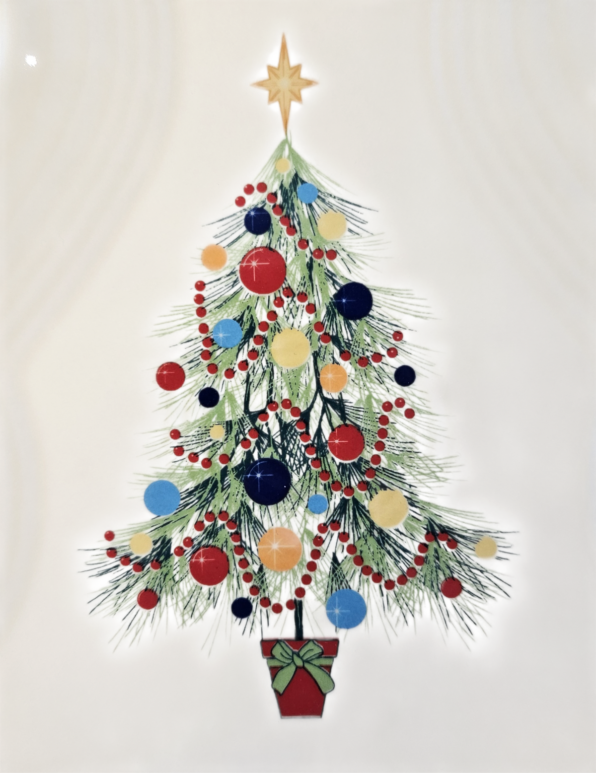This is a Fiesta Fiestaware Tree Shaped Plate featuring the Fiesta Christmas decal on ivory. Post 1986, Lead-free, Christmas, Tree, Decorated, Retired Decal
