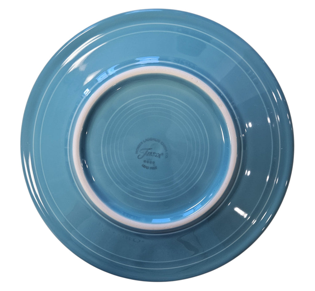 This is a Fiesta Fiestaware Classic Luncheon Plate featuring Everything Kitchen's exclusive Nordic Woodland decal  on Turquoise. Scandinavian, Post 1986, Lead-free, Christmas, Tree, Decorated, Retired Decal, Cabin, Reindeer, Trees
