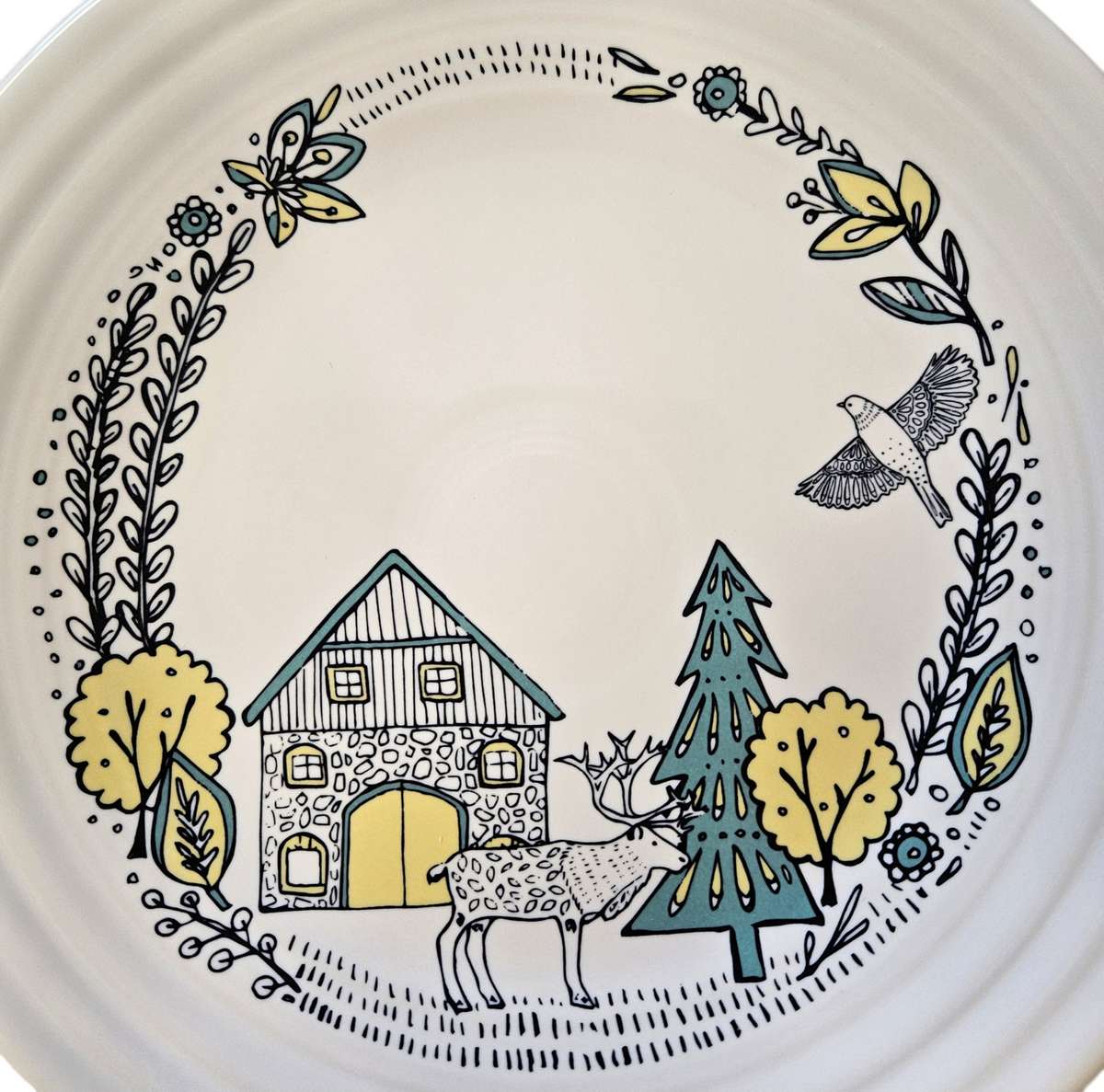 This is a Fiesta Fiestaware Classic Luncheon Plate featuring Everything Kitchen's exclusive Nordic Woodland decal  on White. Scandinavian, Post 1986, Lead-free, Christmas, Tree, Decorated, Retired Decal, Cabin, Reindeer, Trees
