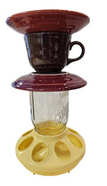 This is a handcrafted Birdfeeder made from a Fiesta Fiestware Cup and two saucers. It includes a glass jar to hold birdseed and either a plastic or metal base for the birds to land and feast. The top saucer is also perfect to hold grape jam or orange slices to feed your local orioles. Please see item description for specific cup and saucer color, jar color and base type. Crafted, Fiesta Second Life
