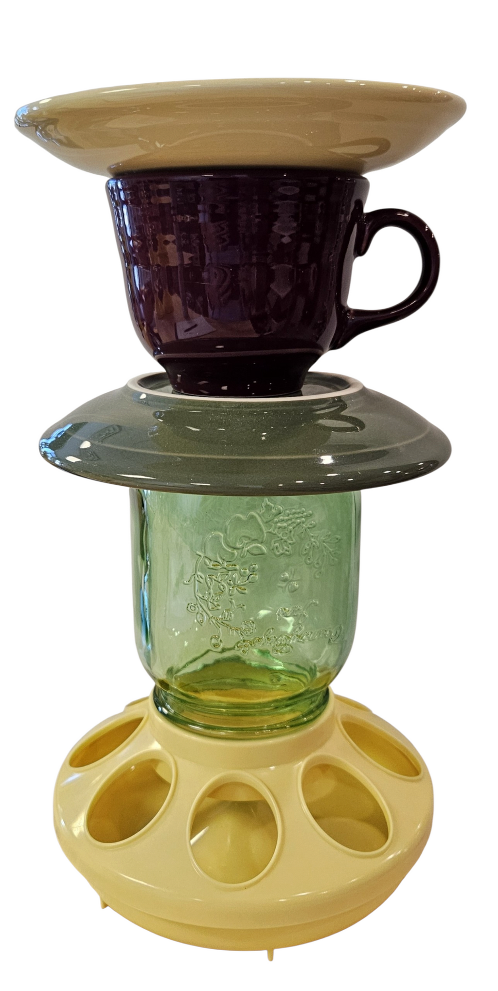 This is a handcrafted Birdfeeder made from a Fiesta Fiestware Cup and two saucers. It includes a glass jar to hold birdseed and either a plastic or metal base for the birds to land and feast. The top saucer is also perfect to hold grape jam or orange slices to feed your local orioles. Please see item description for specific cup and saucer color, jar color and base type. Crafted, Fiesta Second Life
