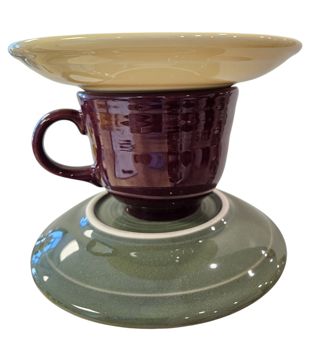 This is a handcrafted Birdfeeder made from a Fiesta Fiestware Cup and two saucers. It includes a glass jar to hold birdseed and either a plastic or metal base for the birds to land and feast. The top saucer is also perfect to hold grape jam or orange slices to feed your local orioles. Please see item description for specific cup and saucer color, jar color and base type. Crafted, Fiesta Second Life
