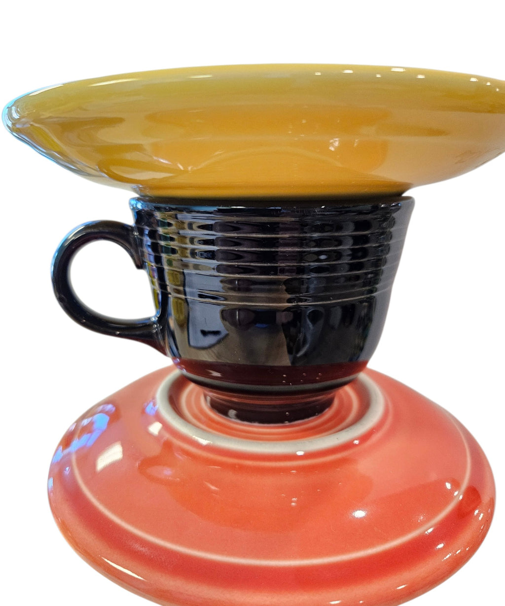 This is a handcrafted Birdfeeder made from a Fiesta Fiestware Cup and two saucers. It includes a glass jar to hold birdseed and either a plastic or metal base for the birds to land and feast. The top saucer is also perfect to hold grape jam or orange slices to feed your local orioles. Please see item description for specific cup and saucer color, jar color and base type. Crafted, Fiesta Second Life
