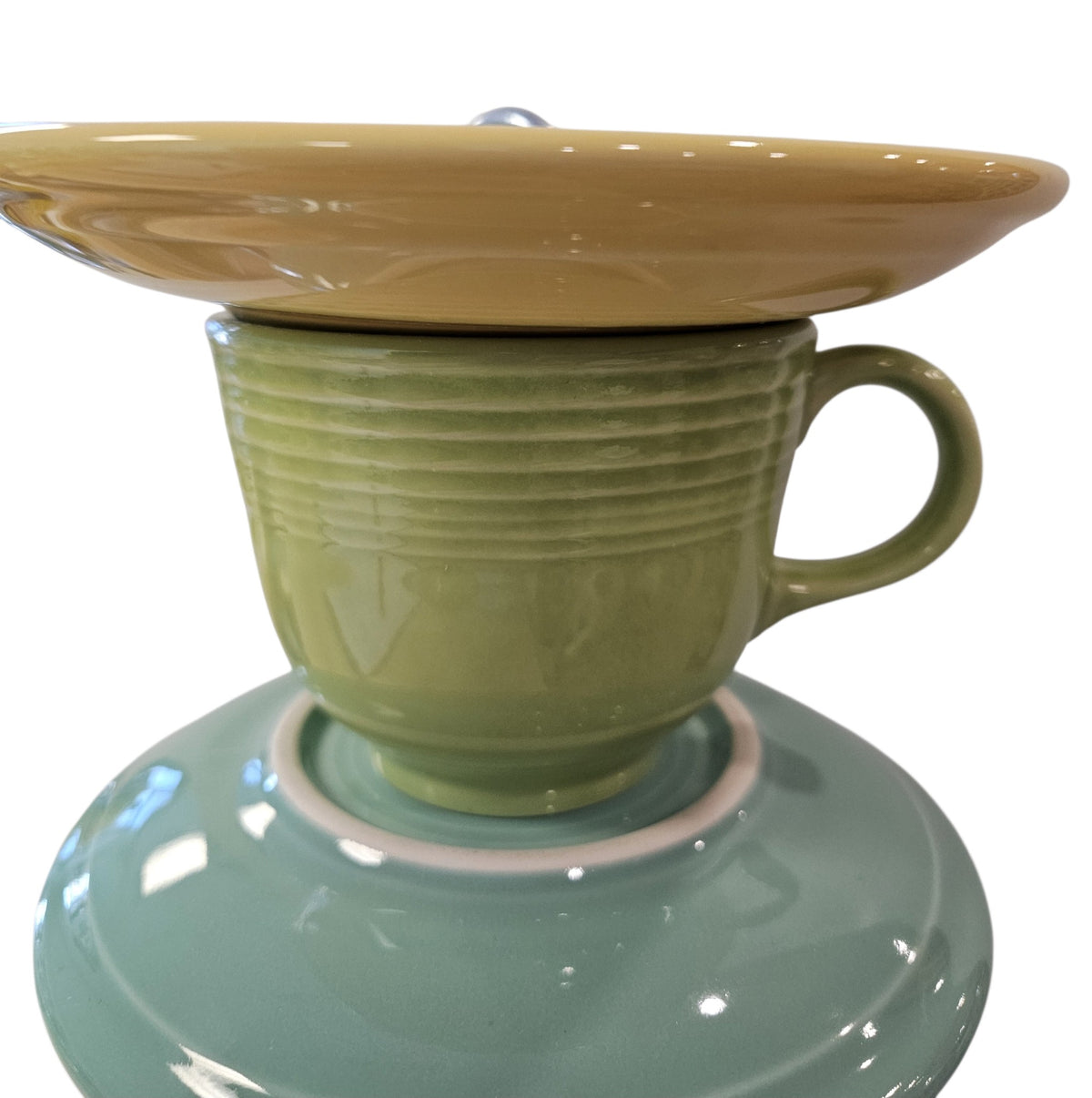 This is a handcrafted Birdfeeder made from a Fiesta Fiestware Cup and two saucers. It includes a glass jar to hold birdseed and either a plastic or metal base for the birds to land and feast. The top saucer is also perfect to hold grape jam or orange slices to feed your local orioles. Please see item description for specific cup and saucer color, jar color and base type. Crafted, Fiesta Second Life
