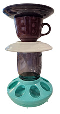 This is a handcrafted Birdfeeder made from a Fiesta Fiestware Cup and two saucers. It includes a glass jar to hold birdseed and either a plastic or metal base for the birds to land and feast. The top saucer is also perfect to hold grape jam or orange slices to feed your local orioles. Please see item description for specific cup and saucer color, jar color and base type. Crafted, Fiesta Second Life
