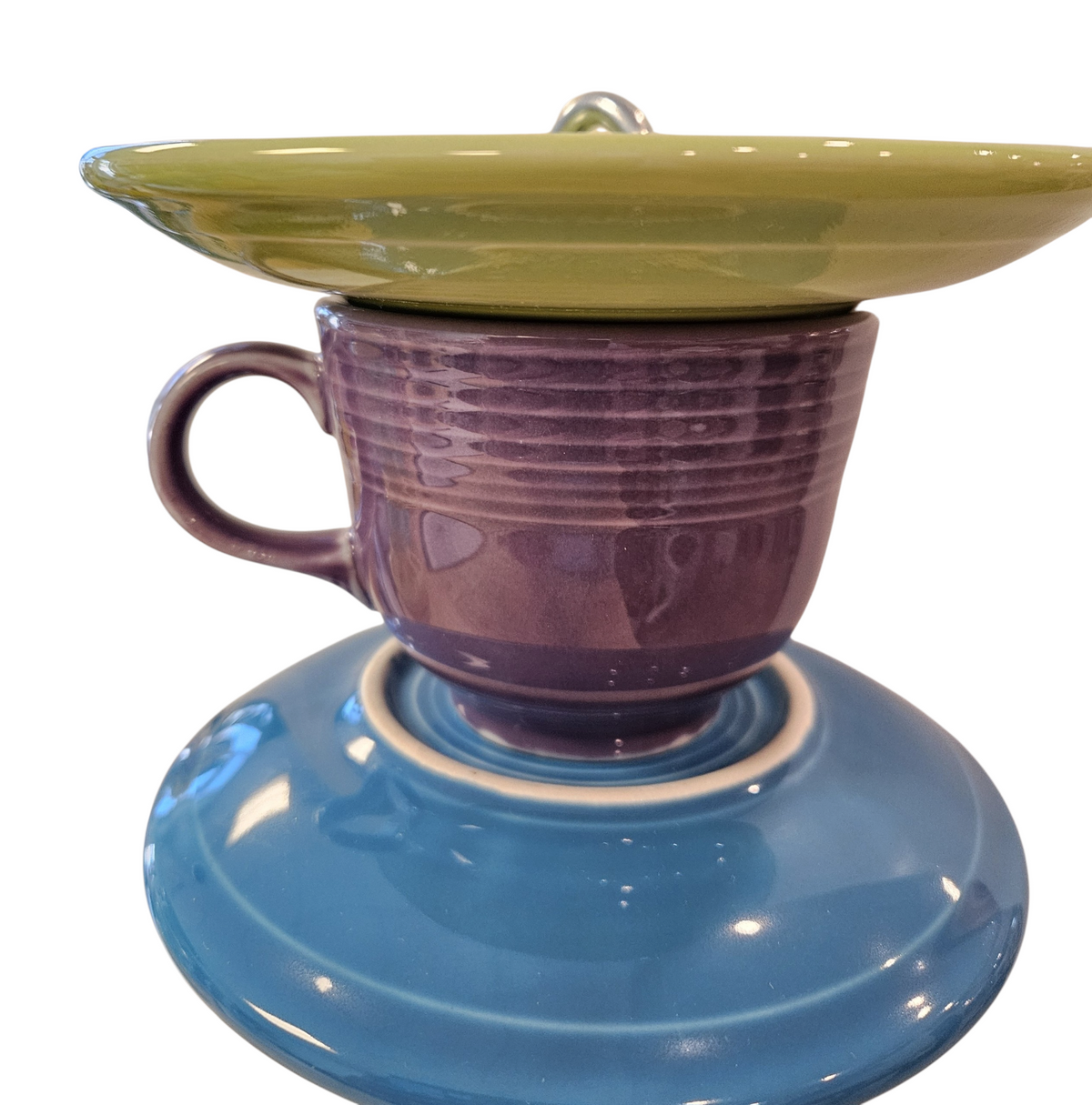 This is a handcrafted Birdfeeder made from a Fiesta Fiestware Cup and two saucers. It includes a glass jar to hold birdseed and either a plastic or metal base for the birds to land and feast. The top saucer is also perfect to hold grape jam or orange slices to feed your local orioles. Please see item description for specific cup and saucer color, jar color and base type. Crafted, Fiesta Second Life

