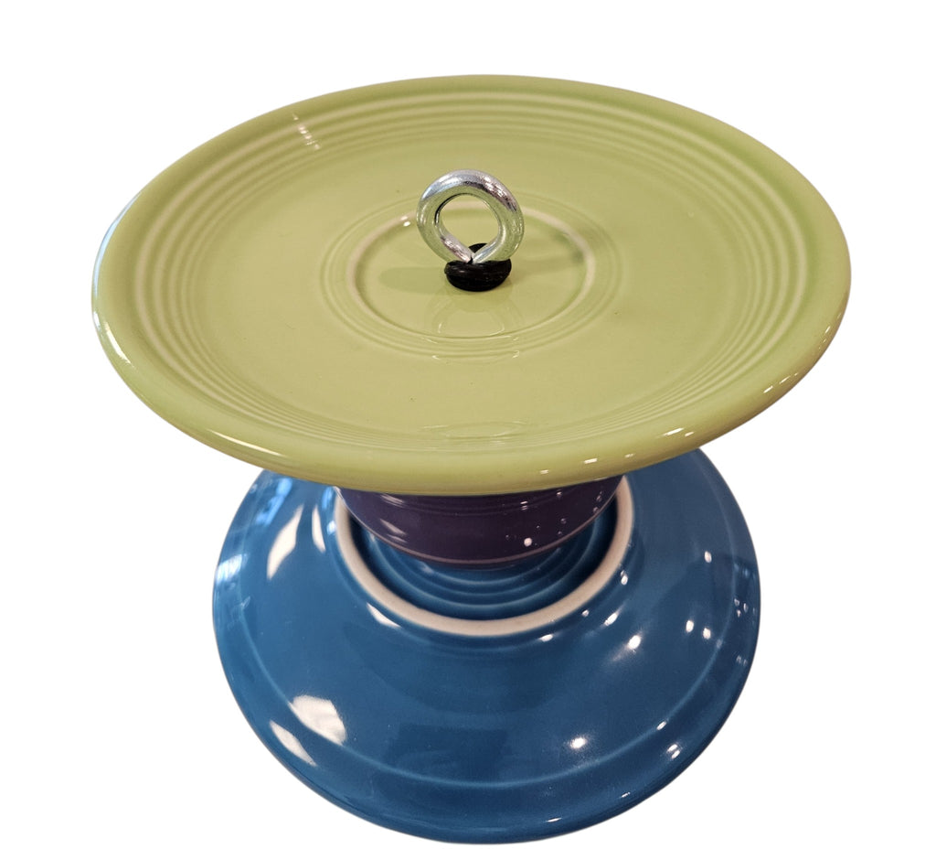 This is a handcrafted Birdfeeder made from a Fiesta Fiestware Cup and two saucers. It includes a glass jar to hold birdseed and either a plastic or metal base for the birds to land and feast. The top saucer is also perfect to hold grape jam or orange slices to feed your local orioles. Please see item description for specific cup and saucer color, jar color and base type. Crafted, Fiesta Second Life
