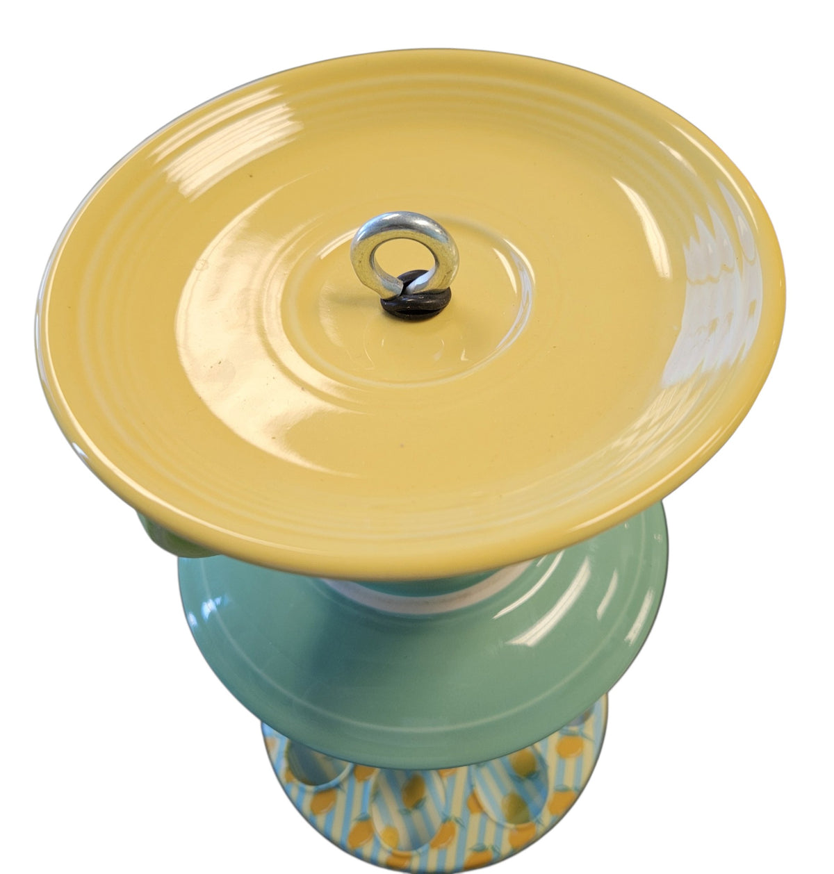 This is a handcrafted Birdfeeder made from a Fiesta Fiestware Cup and two saucers. It includes a glass jar to hold birdseed and either a plastic or metal base for the birds to land and feast. The top saucer is also perfect to hold grape jam or orange slices to feed your local orioles. Please see item description for specific cup and saucer color, jar color and base type. Crafted, Fiesta Second Life
