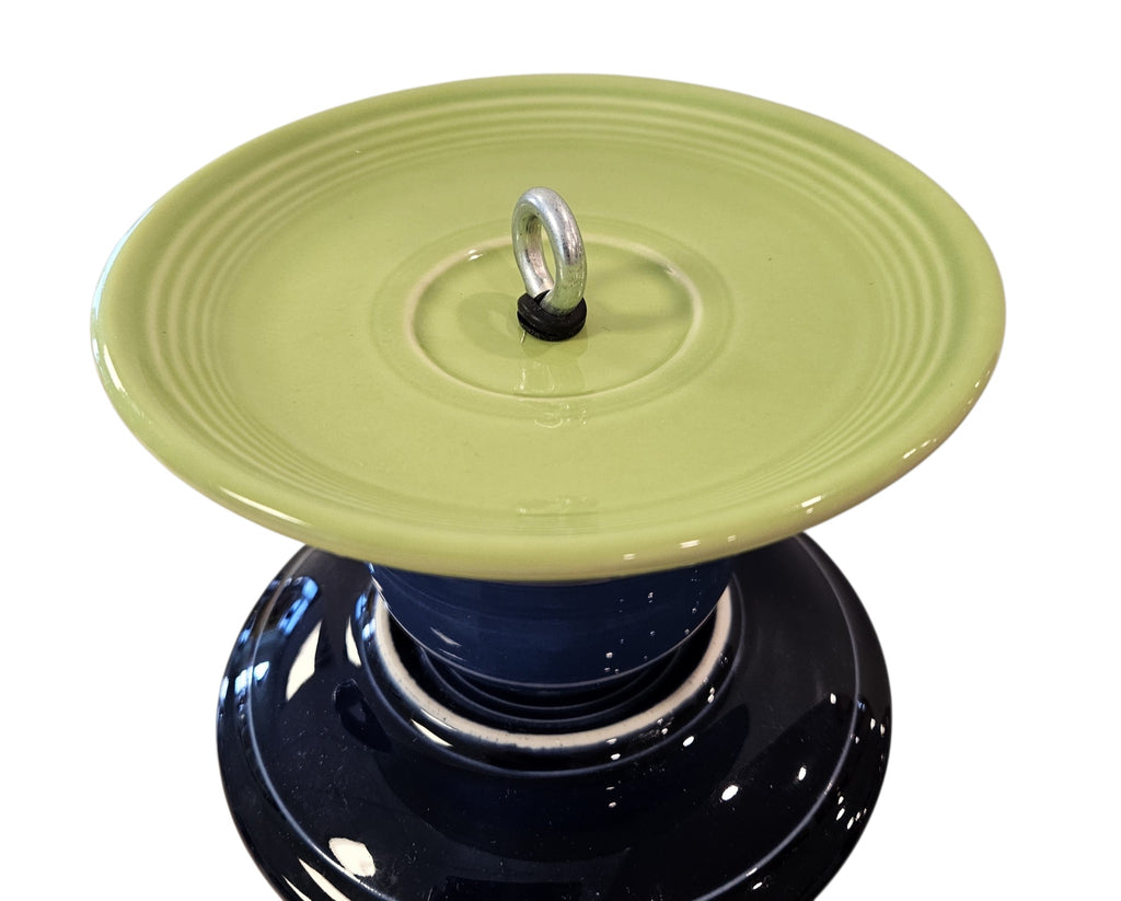 This is a handcrafted Birdfeeder made from a Fiesta Fiestware Cup and two saucers. It includes a glass jar to hold birdseed and either a plastic or metal base for the birds to land and feast. The top saucer is also perfect to hold grape jam or orange slices to feed your local orioles. Please see item description for specific cup and saucer color, jar color and base type. Crafted, Fiesta Second Life
