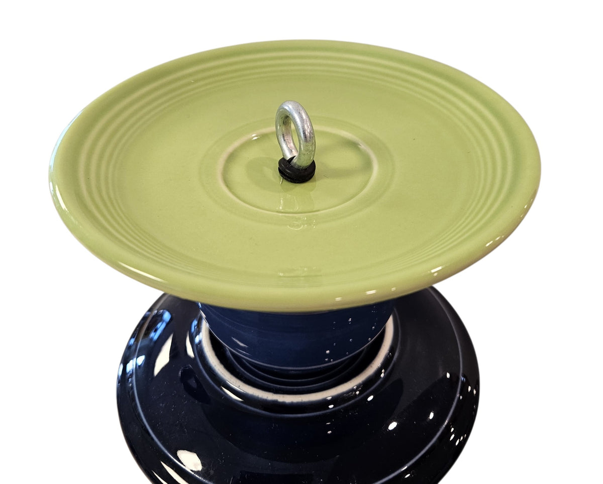 This is a handcrafted Birdfeeder made from a Fiesta Fiestware Cup and two saucers. It includes a glass jar to hold birdseed and either a plastic or metal base for the birds to land and feast. The top saucer is also perfect to hold grape jam or orange slices to feed your local orioles. Please see item description for specific cup and saucer color, jar color and base type. Crafted, Fiesta Second Life
