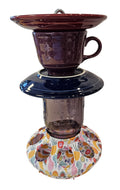 This is a handcrafted Birdfeeder made from a Fiesta Fiestware Cup and two saucers. It includes a glass jar to hold birdseed and either a plastic or metal base for the birds to land and feast. The top saucer is also perfect to hold grape jam or orange slices to feed your local orioles. Please see item description for specific cup and saucer color, jar color and base type. Crafted, Fiesta Second Life
