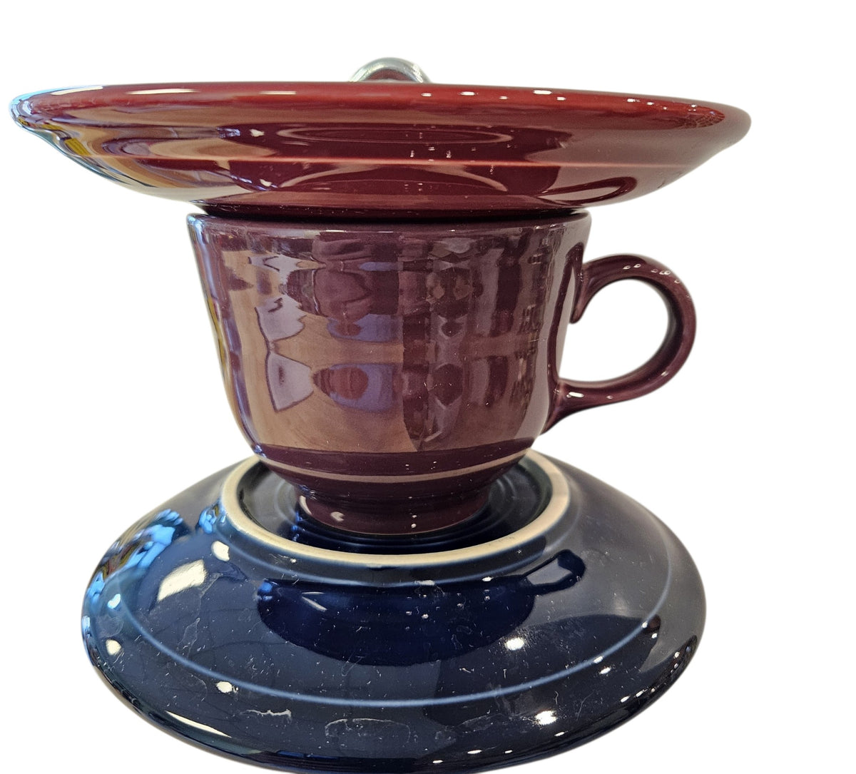 This is a handcrafted Birdfeeder made from a Fiesta Fiestware Cup and two saucers. It includes a glass jar to hold birdseed and either a plastic or metal base for the birds to land and feast. The top saucer is also perfect to hold grape jam or orange slices to feed your local orioles. Please see item description for specific cup and saucer color, jar color and base type. Crafted, Fiesta Second Life
