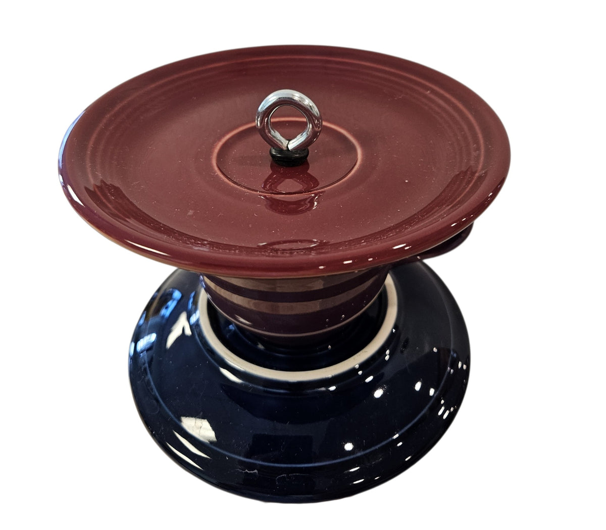 This is a handcrafted Birdfeeder made from a Fiesta Fiestware Cup and two saucers. It includes a glass jar to hold birdseed and either a plastic or metal base for the birds to land and feast. The top saucer is also perfect to hold grape jam or orange slices to feed your local orioles. Please see item description for specific cup and saucer color, jar color and base type. Crafted, Fiesta Second Life
