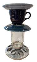 This is a handcrafted Birdfeeder made from a Fiesta Fiestware Cup and two saucers. It includes a glass jar to hold birdseed and either a plastic or metal base for the birds to land and feast. The top saucer is also perfect to hold grape jam or orange slices to feed your local orioles. Please see item description for specific cup and saucer color, jar color and base type. Crafted, Fiesta Second Life
