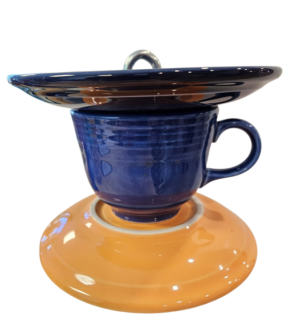 This is a handcrafted Birdfeeder made from a Fiesta Fiestware Cup and two saucers. It includes a glass jar to hold birdseed and either a plastic or metal base for the birds to land and feast. The top saucer is also perfect to hold grape jam or orange slices to feed your local orioles. Please see item description for specific cup and saucer color, jar color and base type. Crafted, Fiesta Second Life
