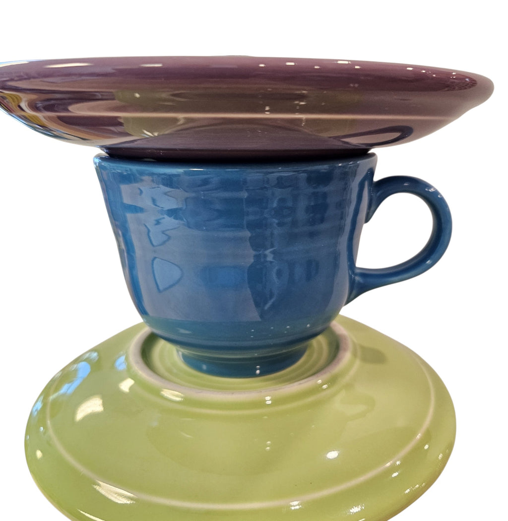 This is a handcrafted Birdfeeder made from a Fiesta Fiestware Cup and two saucers. It includes a glass jar to hold birdseed and either a plastic or metal base for the birds to land and feast. The top saucer is also perfect to hold grape jam or orange slices to feed your local orioles. Please see item description for specific cup and saucer color, jar color and base type. Crafted, Fiesta Second Life
