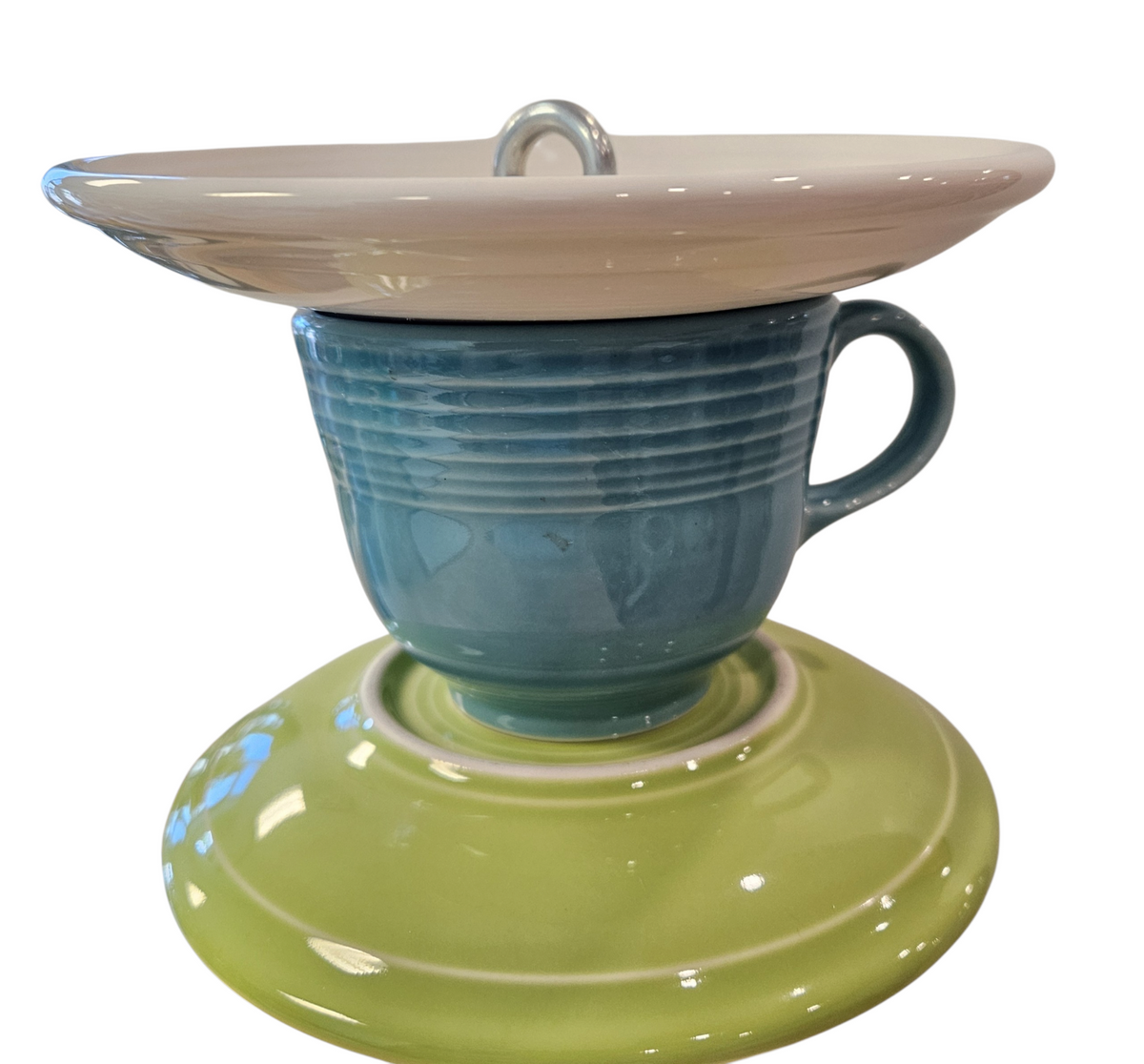 This is a handcrafted Birdfeeder made from a Fiesta Fiestware Cup and two saucers. It includes a glass jar to hold birdseed and either a plastic or metal base for the birds to land and feast. The top saucer is also perfect to hold grape jam or orange slices to feed your local orioles. Please see item description for specific cup and saucer color, jar color and base type. Crafted, Fiesta Second Life
