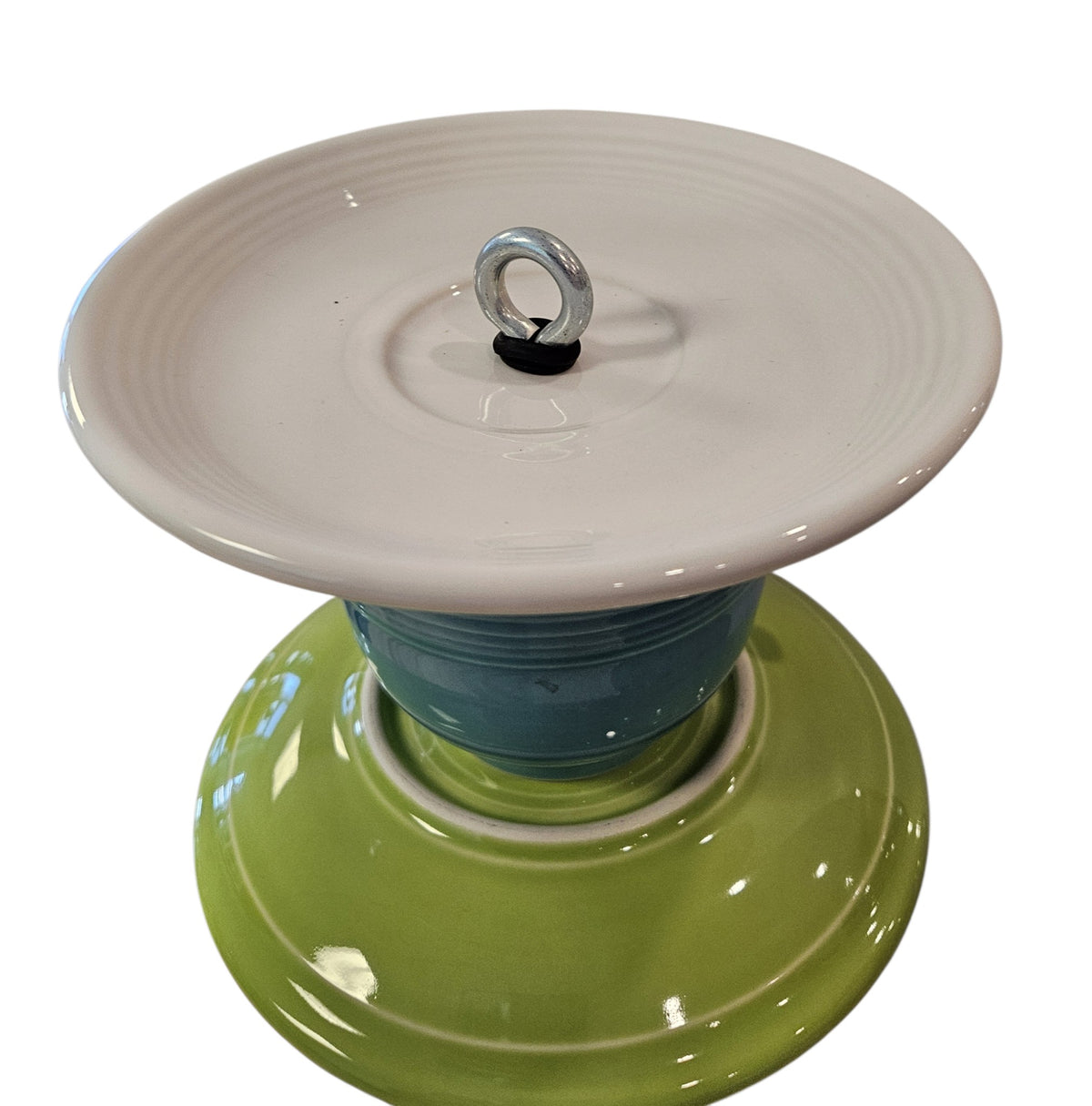 This is a handcrafted Birdfeeder made from a Fiesta Fiestware Cup and two saucers. It includes a glass jar to hold birdseed and either a plastic or metal base for the birds to land and feast. The top saucer is also perfect to hold grape jam or orange slices to feed your local orioles. Please see item description for specific cup and saucer color, jar color and base type. Crafted, Fiesta Second Life
