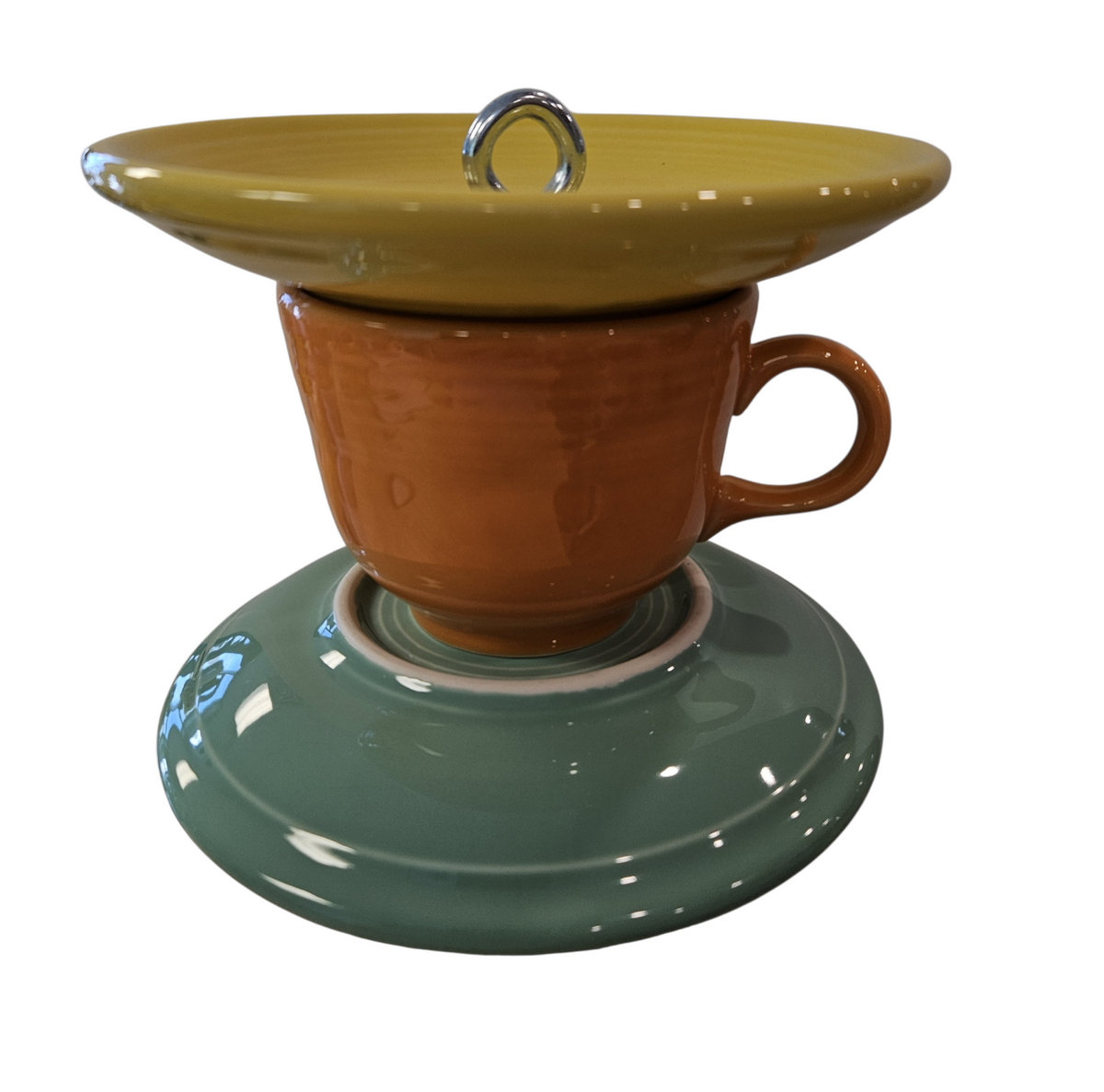 This is a handcrafted Birdfeeder made from a Fiesta Fiestware Cup and two saucers. It includes a glass jar to hold birdseed and either a plastic or metal base for the birds to land and feast. The top saucer is also perfect to hold grape jam or orange slices to feed your local orioles. Please see item description for specific cup and saucer color, jar color and base type. Crafted, Fiesta Second Life
