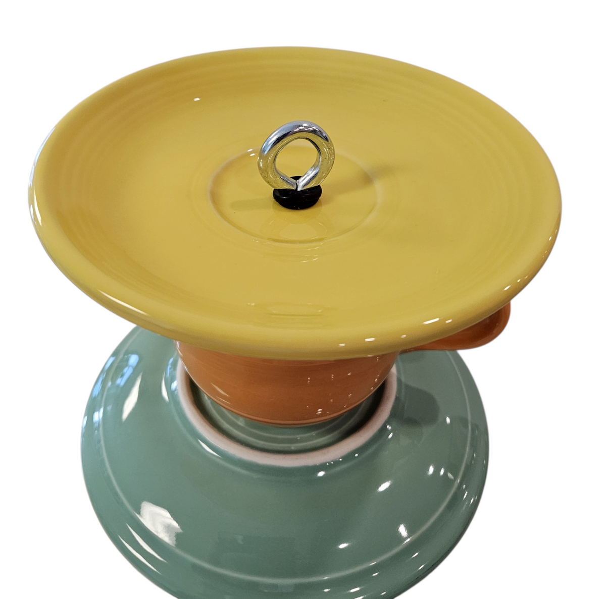 This is a handcrafted Birdfeeder made from a Fiesta Fiestware Cup and two saucers. It includes a glass jar to hold birdseed and either a plastic or metal base for the birds to land and feast. The top saucer is also perfect to hold grape jam or orange slices to feed your local orioles. Please see item description for specific cup and saucer color, jar color and base type. Crafted, Fiesta Second Life
