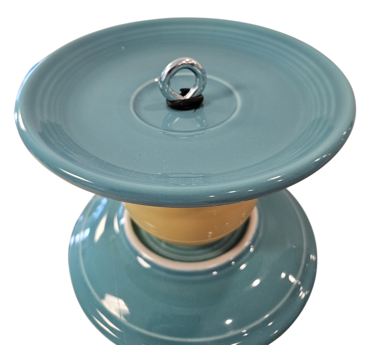 This is a handcrafted Birdfeeder made from a Fiesta Fiestware Cup and two saucers. It includes a glass jar to hold birdseed and either a plastic or metal base for the birds to land and feast. The top saucer is also perfect to hold grape jam or orange slices to feed your local orioles. Please see item description for specific cup and saucer color, jar color and base type. Crafted, Fiesta Second Life
