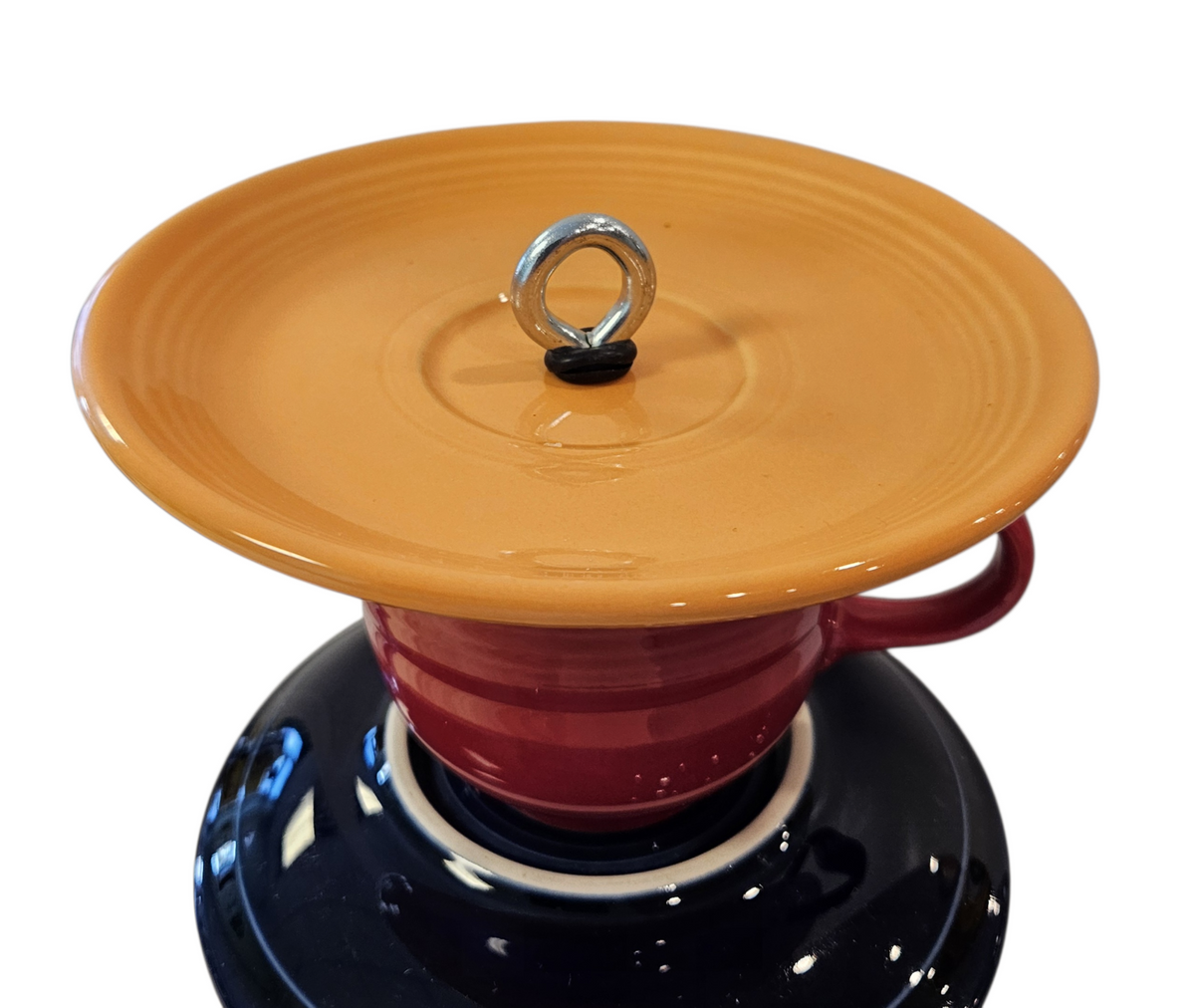 This is a handcrafted Birdfeeder made from a Fiesta Fiestware Cup and two saucers. It includes a glass jar to hold birdseed and either a plastic or metal base for the birds to land and feast. The top saucer is also perfect to hold grape jam or orange slices to feed your local orioles. Please see item description for specific cup and saucer color, jar color and base type. Crafted, Fiesta Second Life

