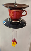 This is a handcrafted Hummingbird Feeder made from a Fiesta Fiestware Cup and two saucers. It includes a plastic nectar holder. While not included but shown in additional pictures, these can be used to hold chimes, a windsock, or other decoration. Please see item description for specific cup and saucer color.  Crafted, Fiesta Second Life
