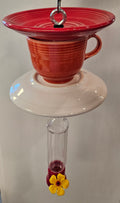 This is a handcrafted Hummingbird Feeder made from a Fiesta Fiestware Cup and two saucers. It includes a plastic nectar holder. While not included but shown in additional pictures, these can be used to hold chimes, a windsock, or other decoration. Please see item description for specific cup and saucer color.  Crafted, Fiesta Second Life
