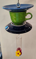 This is a handcrafted Hummingbird Feeder made from a Fiesta Fiestware Cup and two saucers. It includes a plastic nectar holder. While not included but shown in additional pictures, these can be used to hold chimes, a windsock, or other decoration. Please see item description for specific cup and saucer color.  Crafted, Fiesta Second Life
