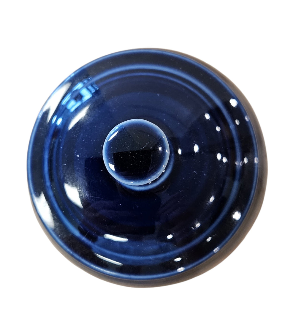 This is a Fiesta Fiestaware Individual Sugar Bowl With Lid in cobalt. lead-free, Post 1986, Retired Color Retired Shape