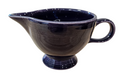 This is a Fiesta Fiestaware individual cream pitcher creamer in Plum. lead-free, Post 1986, Retired Color Retired Shape
