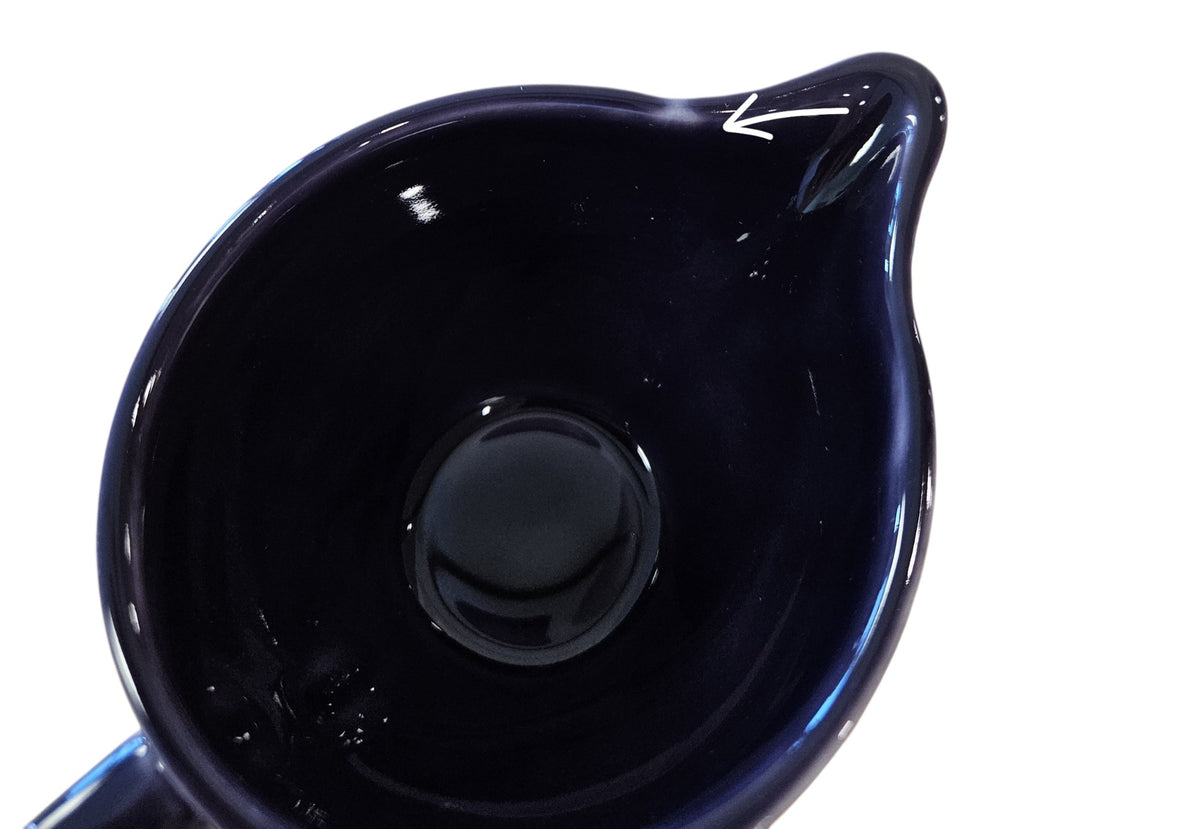 This is a Fiesta Fiestaware individual cream pitcher creamer in Plum. lead-free, Post 1986, Retired Color Retired Shape

