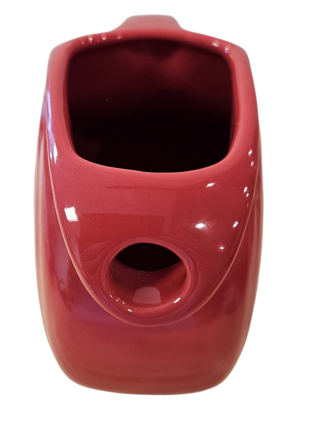This is a Fiesta Fiestaware Small Disc Juice Pitcher in scarlet. lead-free, Post 1986, Retired Shape 28 ounce capacity
