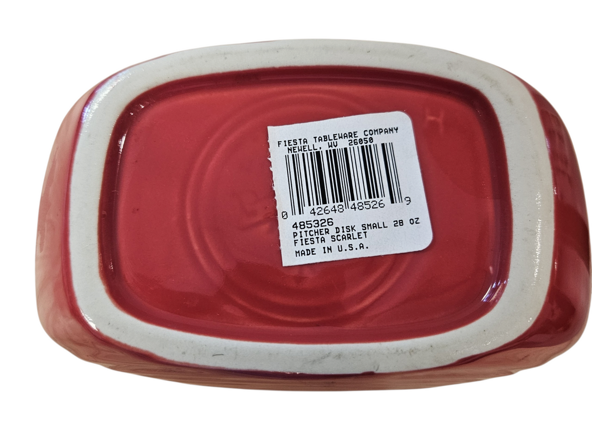 This is a Fiesta Fiestaware Small Disc Juice Pitcher in scarlet. lead-free, Post 1986, Retired Shape 28 ounce capacity

