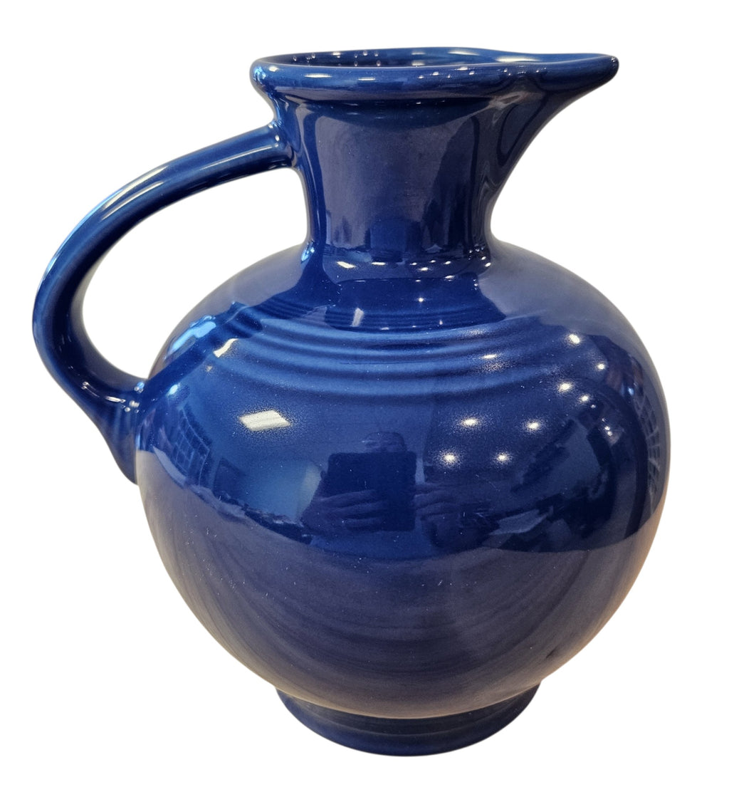This is a Fiesta Fiestware 60 Ounce Carafe in Sapphire. Lead-free Post 1986 Retired color retired shape
