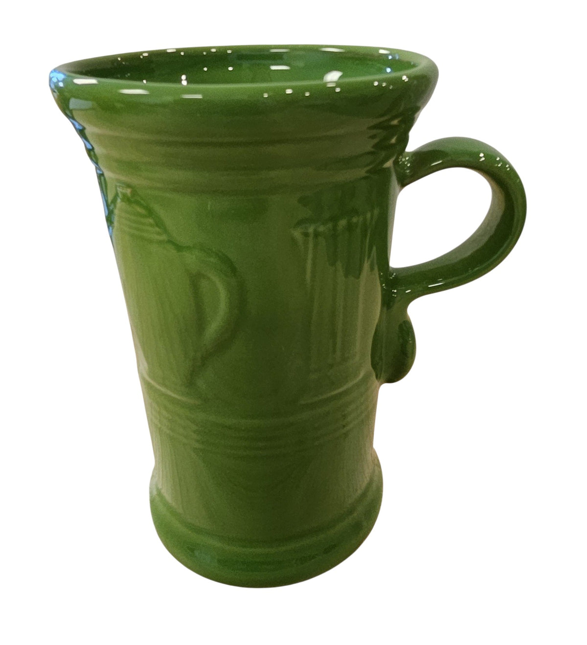 This is a Fiesta Fiestaware Cappuccino Mug in Shamrock. The mug features iconic embossed Fiesta shapes. Post 1986 Lead-free Retired Color Retired Shape
