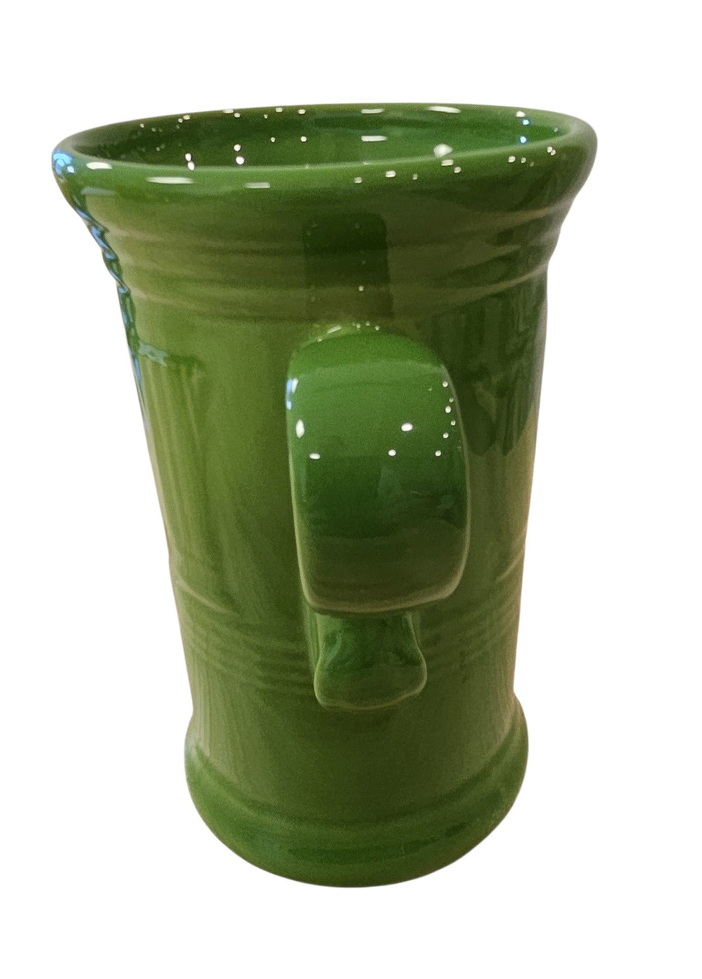 This is a Fiesta Fiestaware Cappuccino Mug in Shamrock. The mug features iconic embossed Fiesta shapes. Post 1986 Lead-free Retired Color Retired Shape
