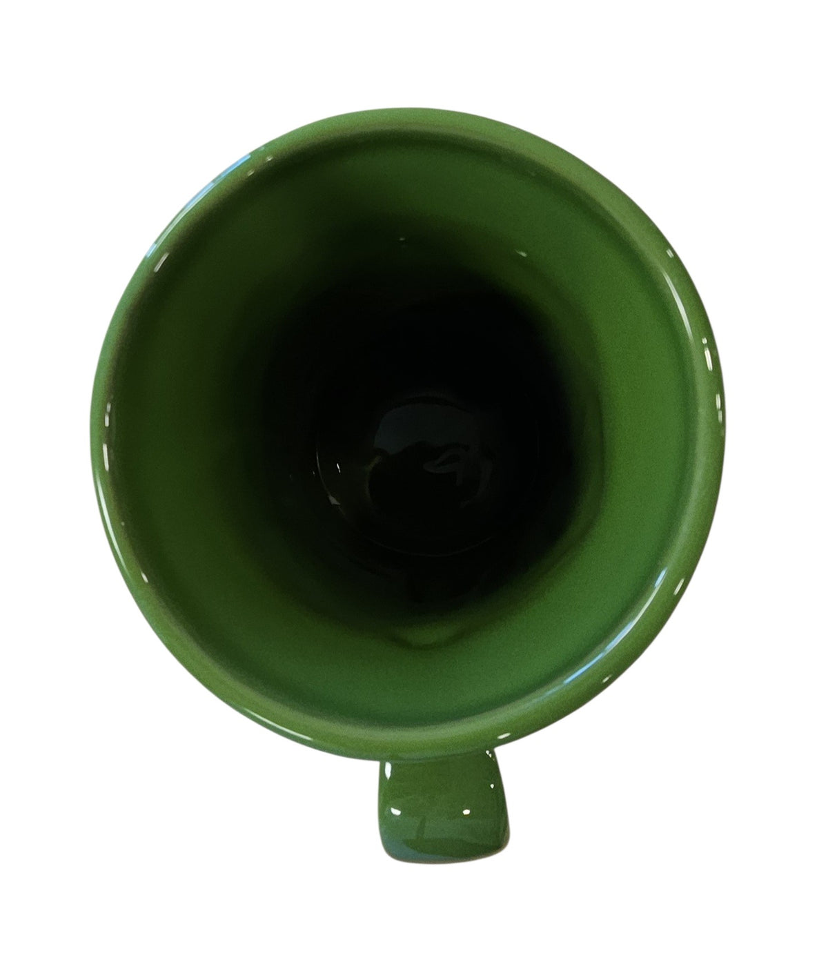 This is a Fiesta Fiestaware Cappuccino Mug in Shamrock. The mug features iconic embossed Fiesta shapes. Post 1986 Lead-free Retired Color Retired Shape
