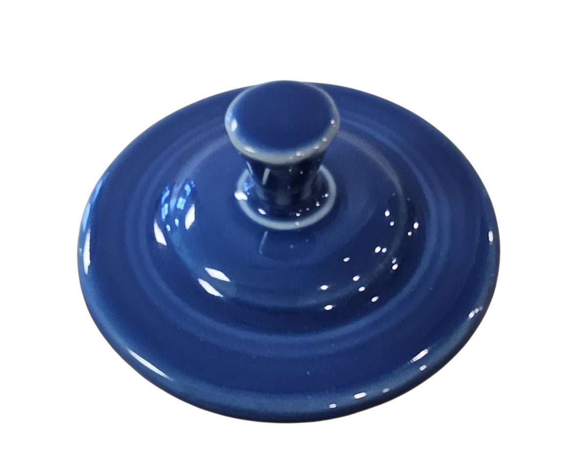 This is a Fiesta Fiestaware Creamer Pitcher Sugar Bowl with Lid on Figure Eight 8 Tray Set in Lapis. lead-free, Post 1986, Retired Shape
