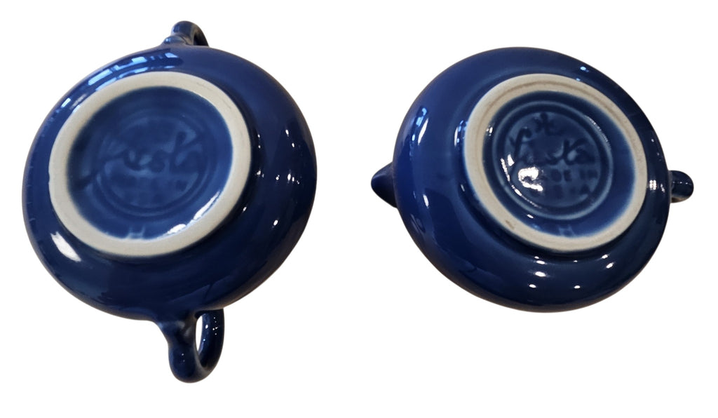 This is a Fiesta Fiestaware Creamer Pitcher Sugar Bowl with Lid on Figure Eight 8 Tray Set in Lapis. lead-free, Post 1986, Retired Shape
