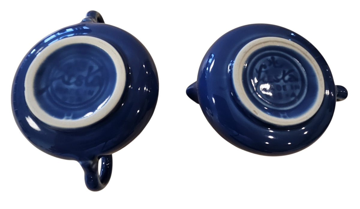This is a Fiesta Fiestaware Creamer Pitcher Sugar Bowl with Lid on Figure Eight 8 Tray Set in Lapis. lead-free, Post 1986, Retired Shape
