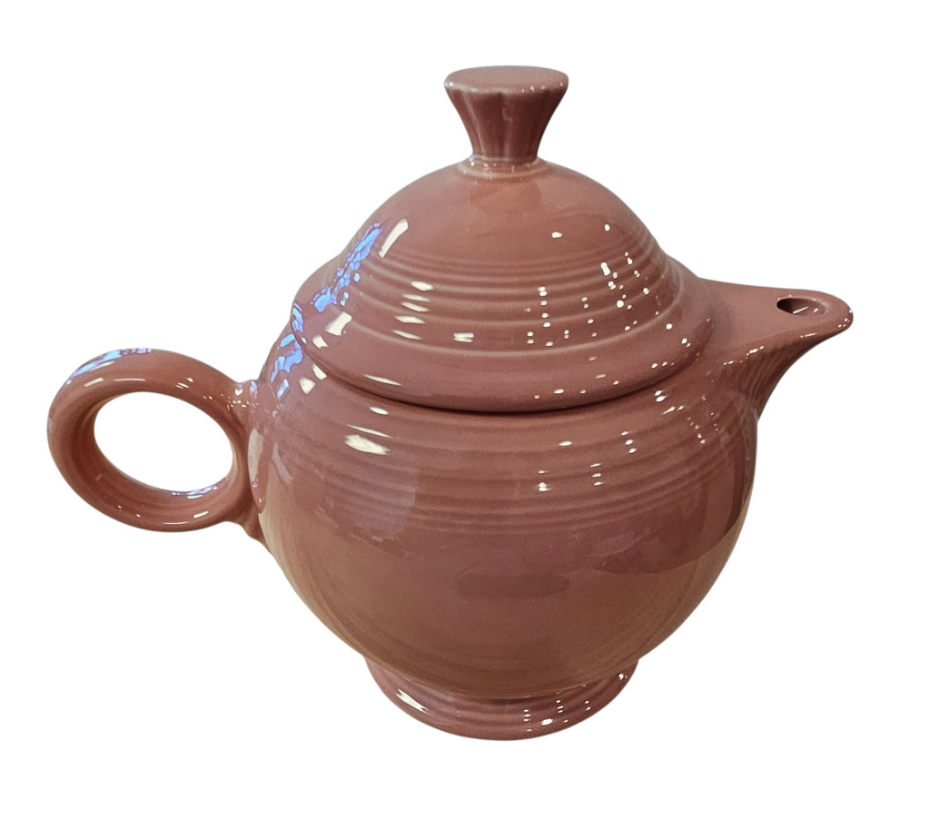 This is a Fiesta Fiestaware Five-cup 5-cup Ring Handled Tea Pot with Lid in Rose. lead-free, Post 1986, Retired Color Retired Shape
