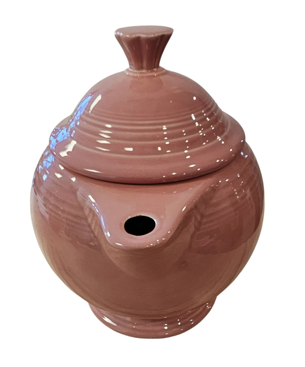 This is a Fiesta Fiestaware Five-cup 5-cup Ring Handled Tea Pot with Lid in Rose. lead-free, Post 1986, Retired Color Retired Shape
